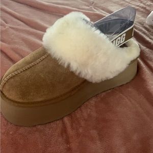 Brand new ladies UGG in size 8.